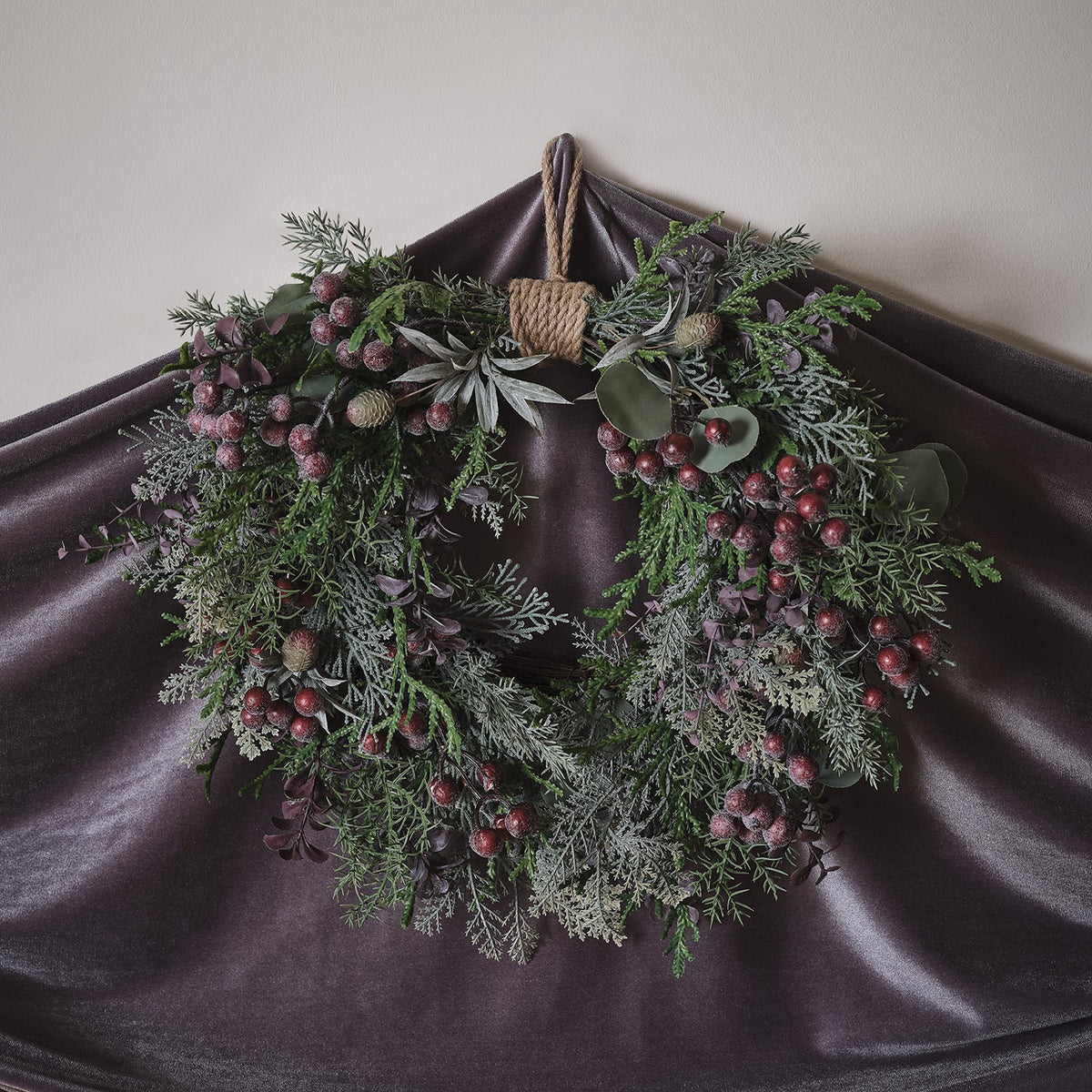 Heart-shaped wreath illuminated with purple berries – 40 cm