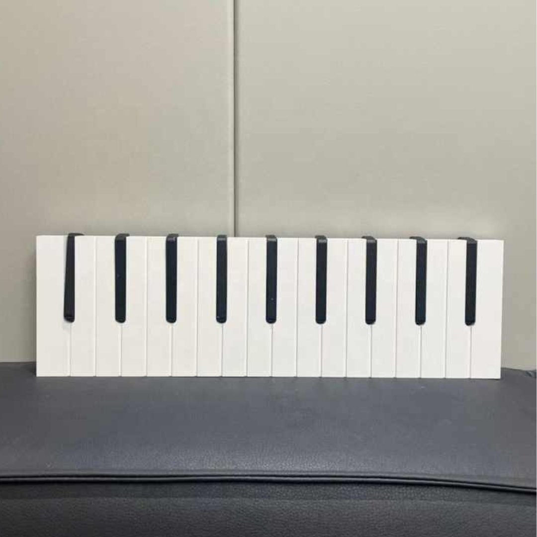 PianoRack Wall-Mounted Coat Rack in Piano Design