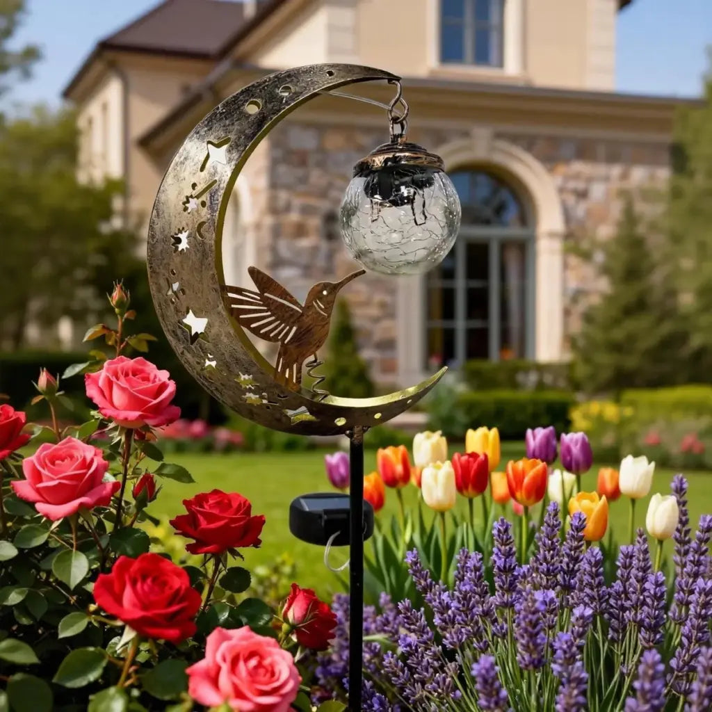 SolarBird – Solar-powered crescent garden light with bird design