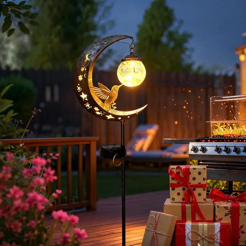 SolarBird – Solar-powered crescent garden light with bird design